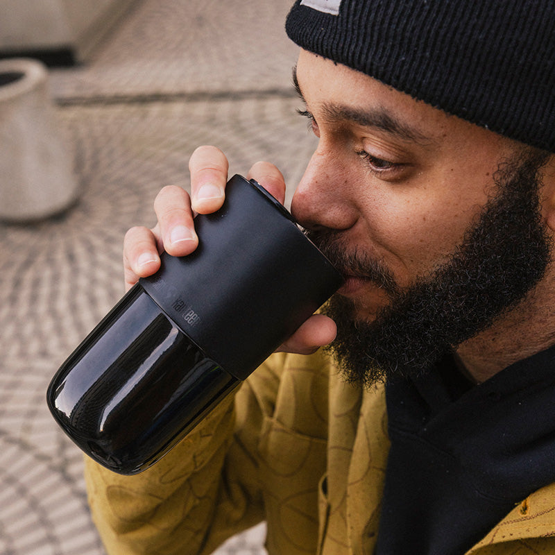 16oz-rise-tumbler-l0 16oz_rise_tumbler_black_man_drink_square.jpg