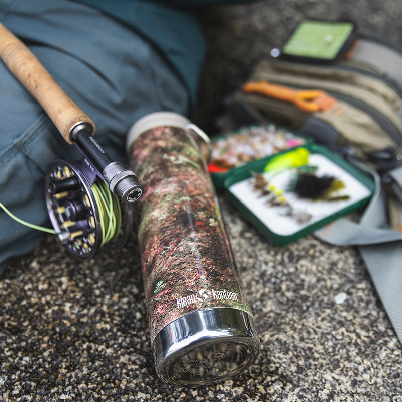 20oz-tkwide-with-cafe-cap-mossy-oak-d2 20oz_tumbler_mossyoak_rainbowtrout_flyfish_top_square.jpg