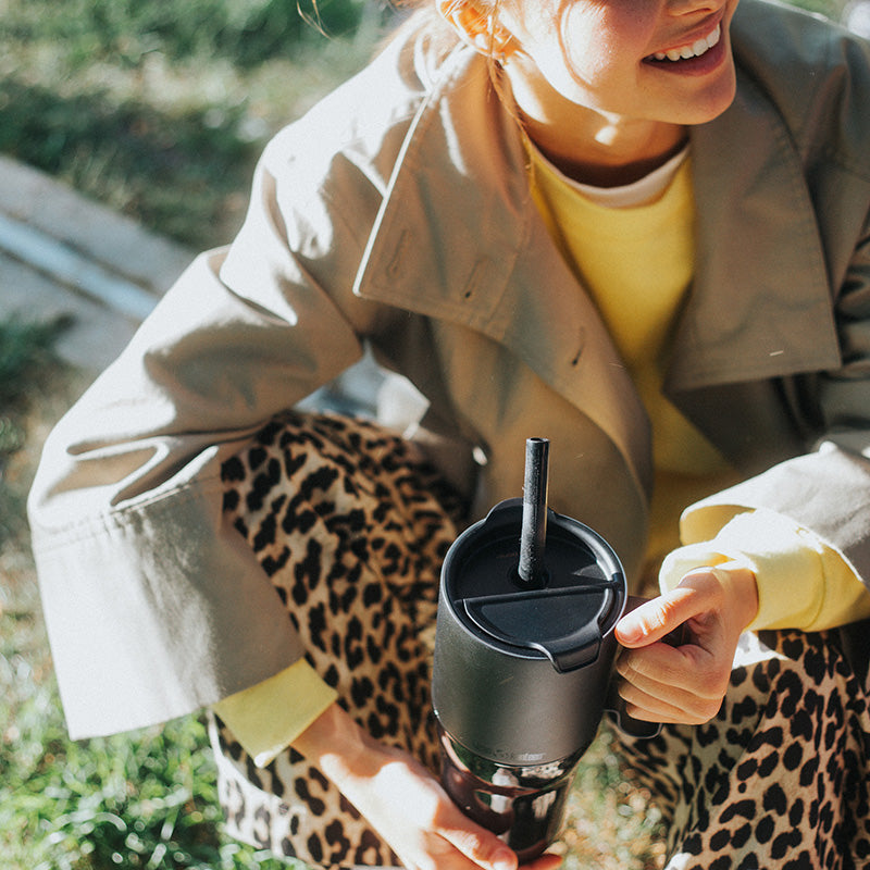 26oz-rise-tumbler-with-straw-lid-y6 26oz_rise_tumbler_black_woman_topview_square.jpg