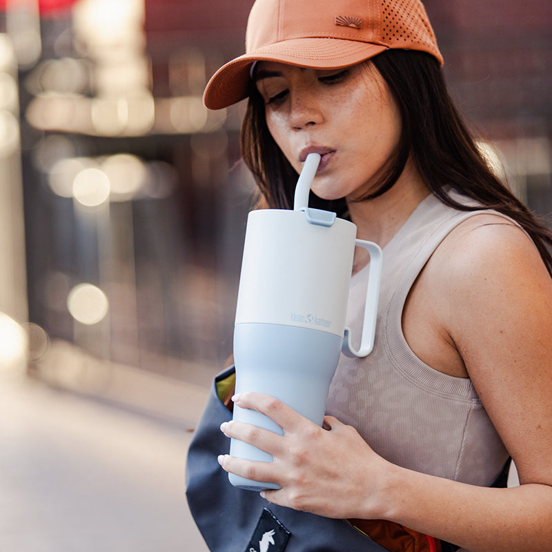 36oz-rise-tumbler-with-straw-lid-f6 36oz_rise_tumbler_straw_girl_sip_square.jpg