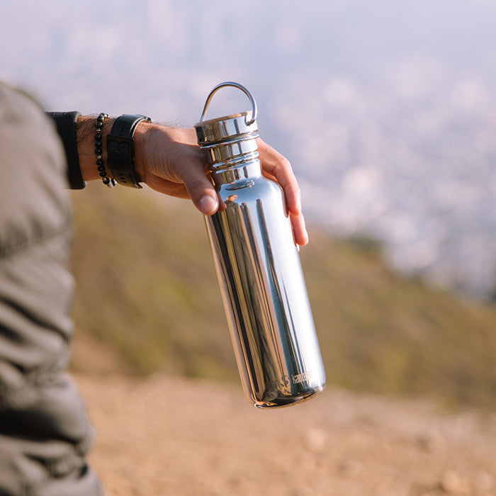 27oz-reflect-with-bamboo-cap-m3 K27SSLRF-MS-BAMBOO_reflect_bottle_hand_lifestyle.jpg