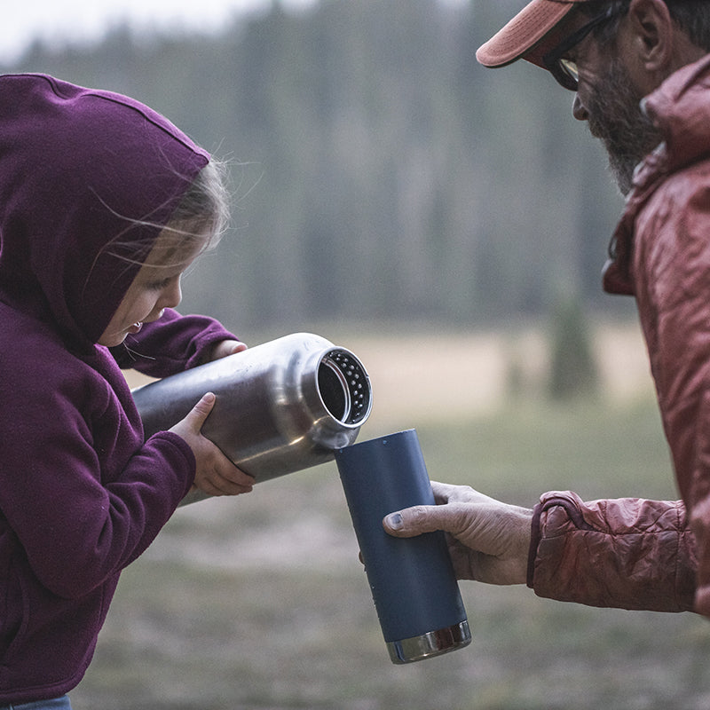64oz-tkwide-with-loop-cap-v9 tkwide_64oz_bottle_girl_dad_filling_square.jpg
